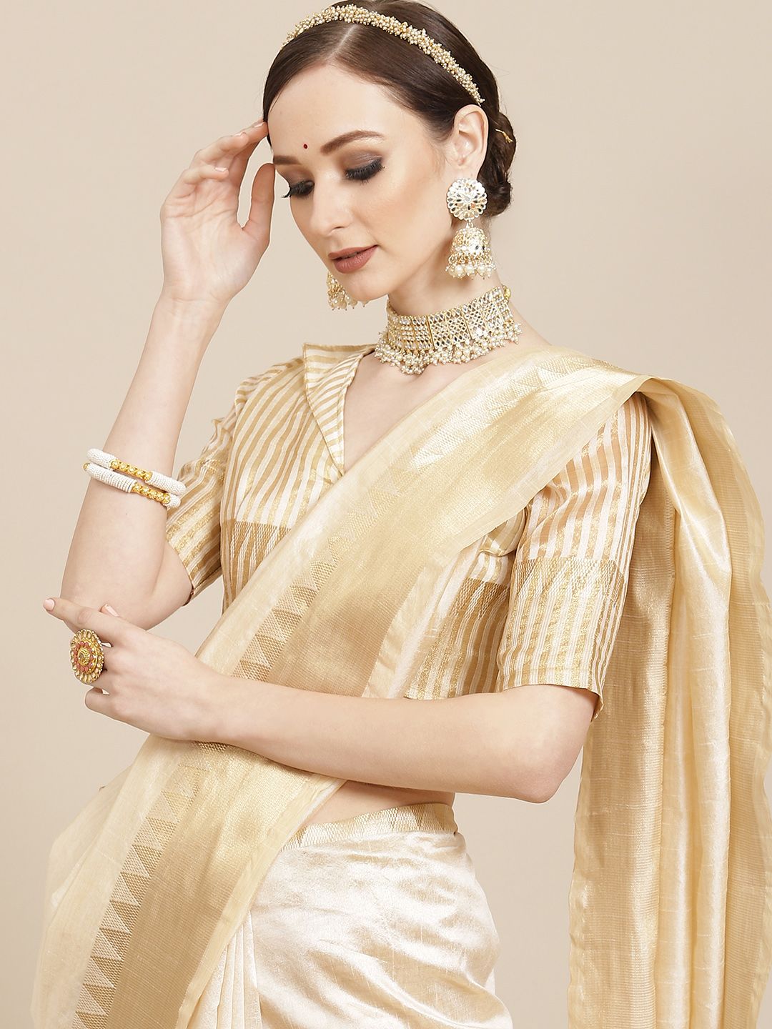 KALINI Off White & Golden Woven Design Saree Price in India