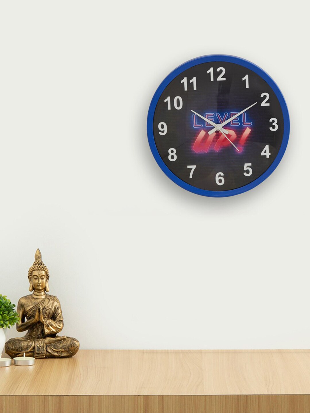 Home Centre Blue & Black Printed Analogue Contemporary Wall Clock Price in India