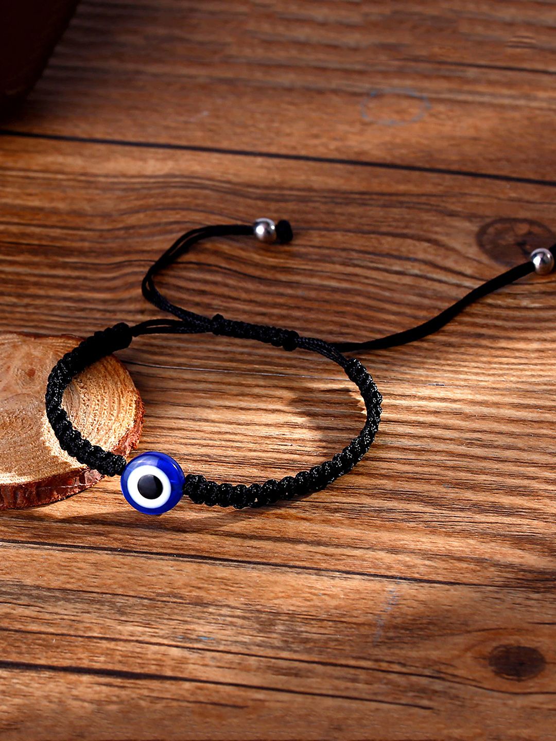 Yellow Chimes Unisex Black & Blue Evil Eye Bead Wraparound Bracelet deal from myntra