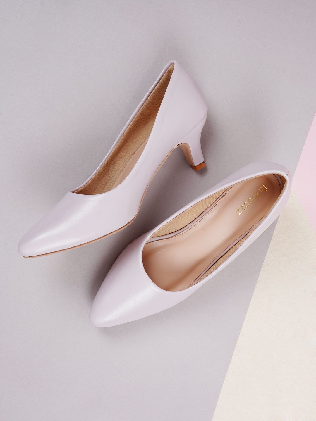 Rubeezz Lavender Solid Kitten Pumps Price in India