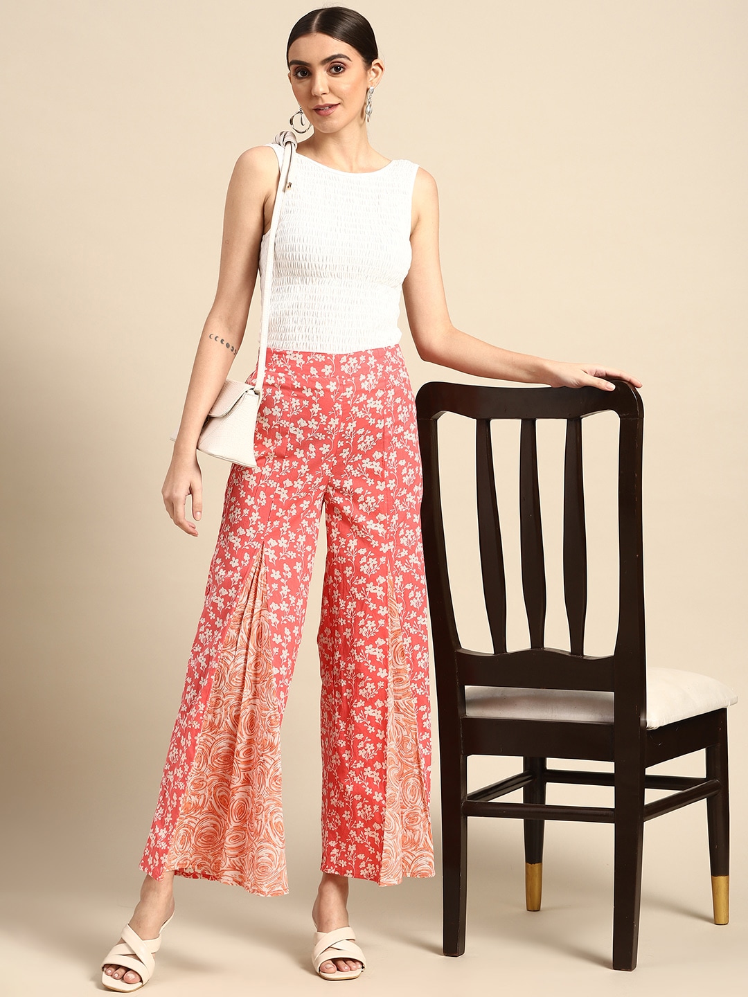 Anouk Women Coral & White Ethnic Motifs Printed Flared Knitted Ethnic Palazzos Price in India