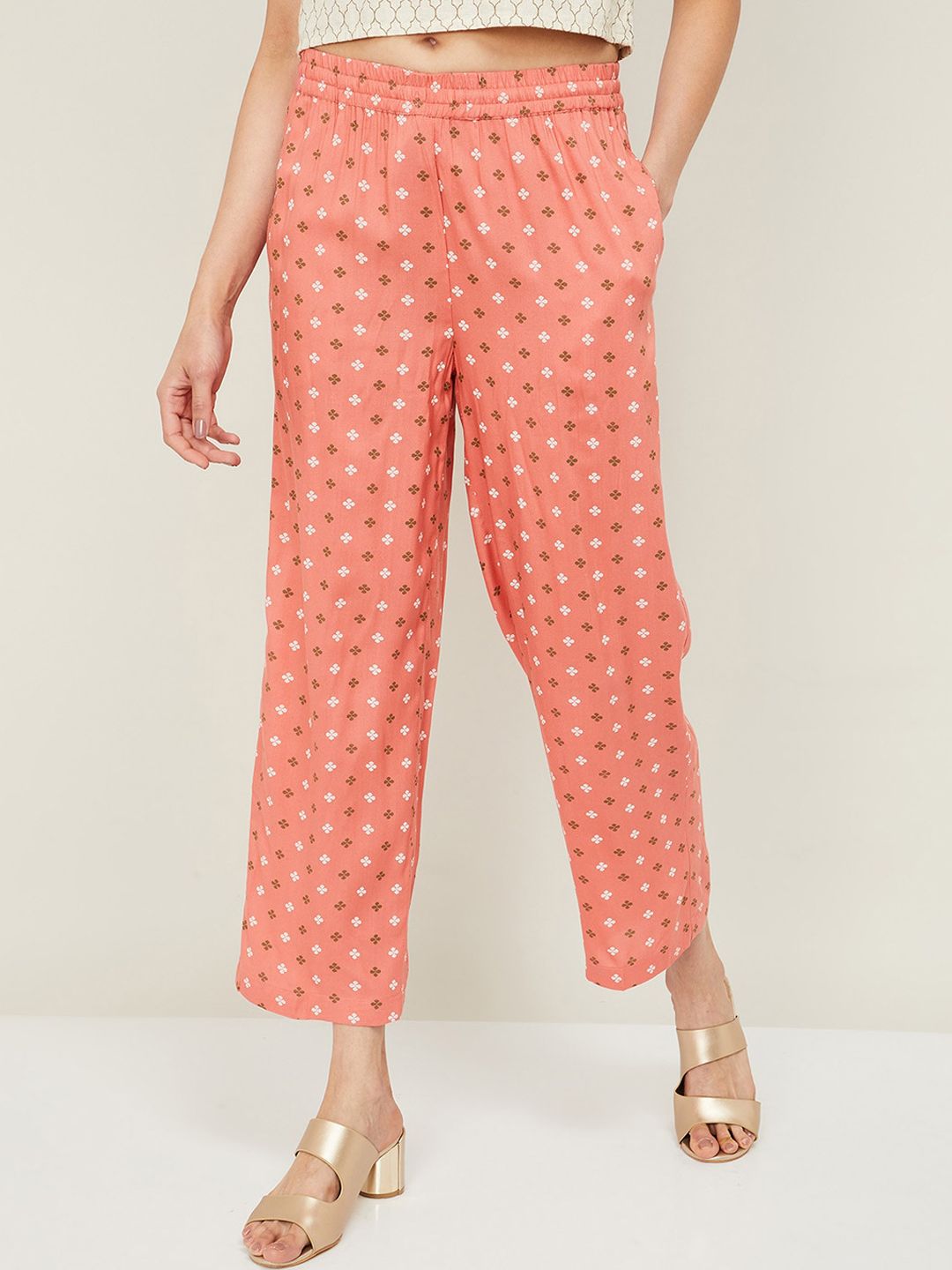 Melange by Lifestyle Women Coral & White Floral Printed Trousers Price in India