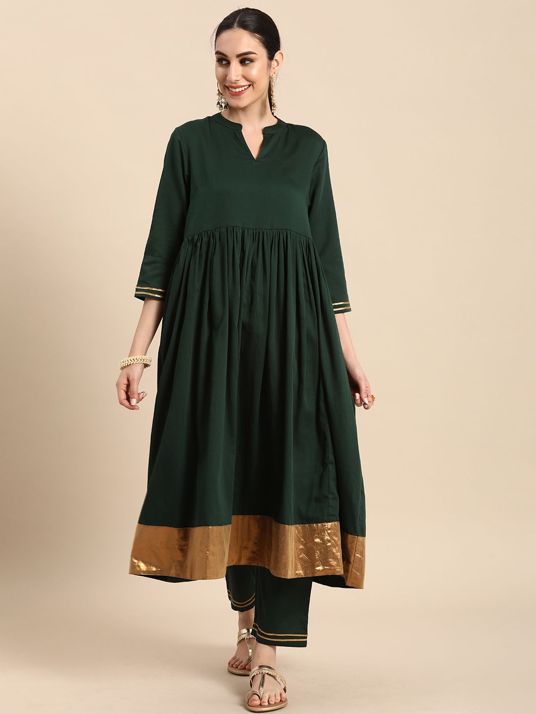 Anouk Women Bottle Green Empire Sequinned Pure Cotton Kurta with Trousers Price in India