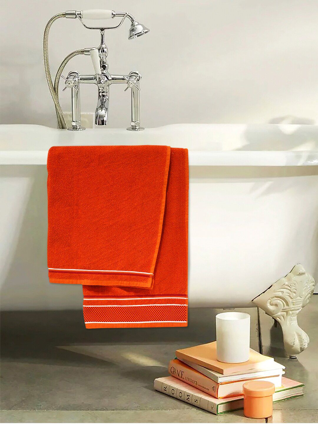 Divine Casa Orange Solid 500 GSM Bath Towel Price in India