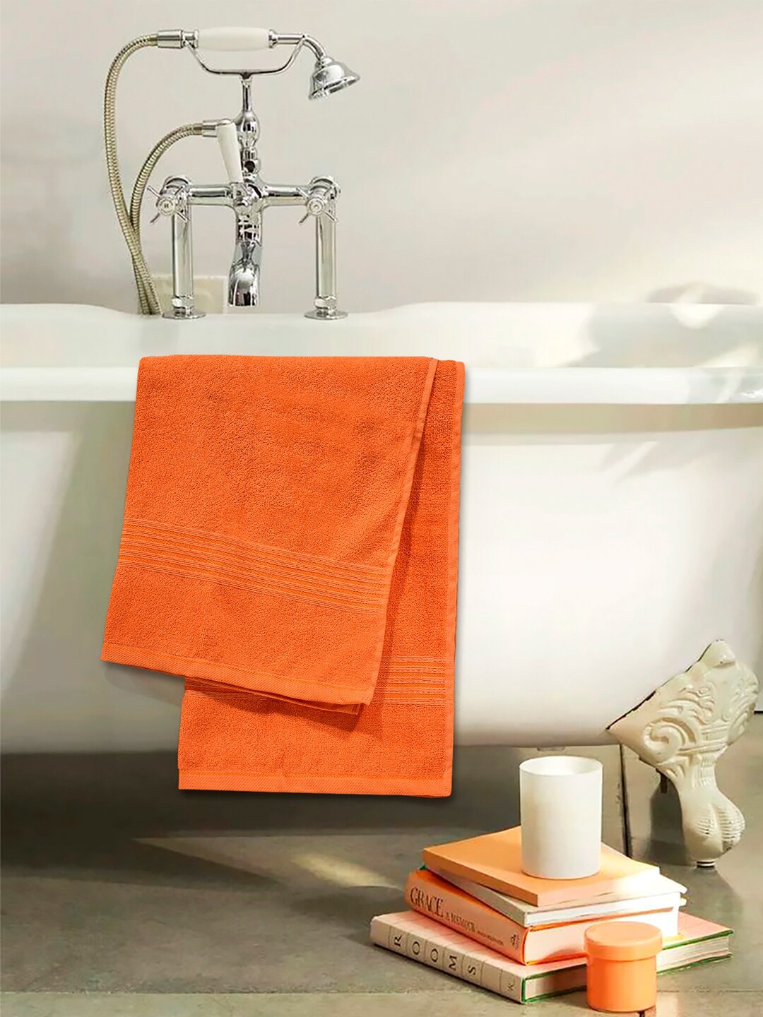 Divine Casa Bright Orange Solid Cotton 500 GSM Bath Towel Price in India