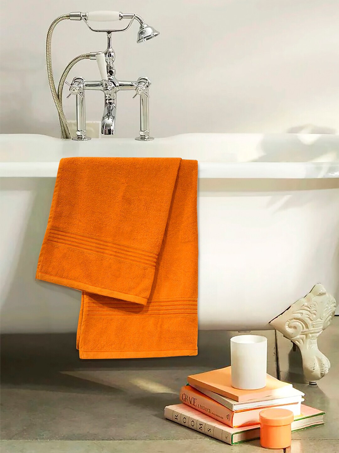 Divine Casa Orange Solid Cotton 500 GSM Bath Towel Price in India