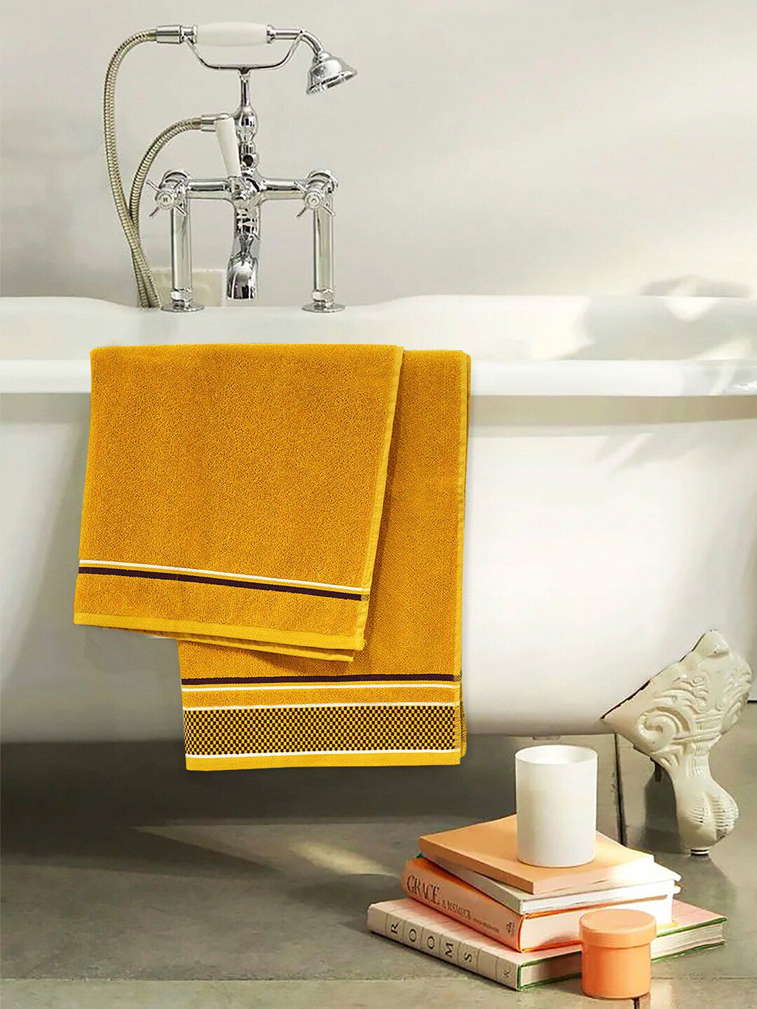 Divine Casa Yellow Solid 500 GSM Cotton Bath Towel Price in India