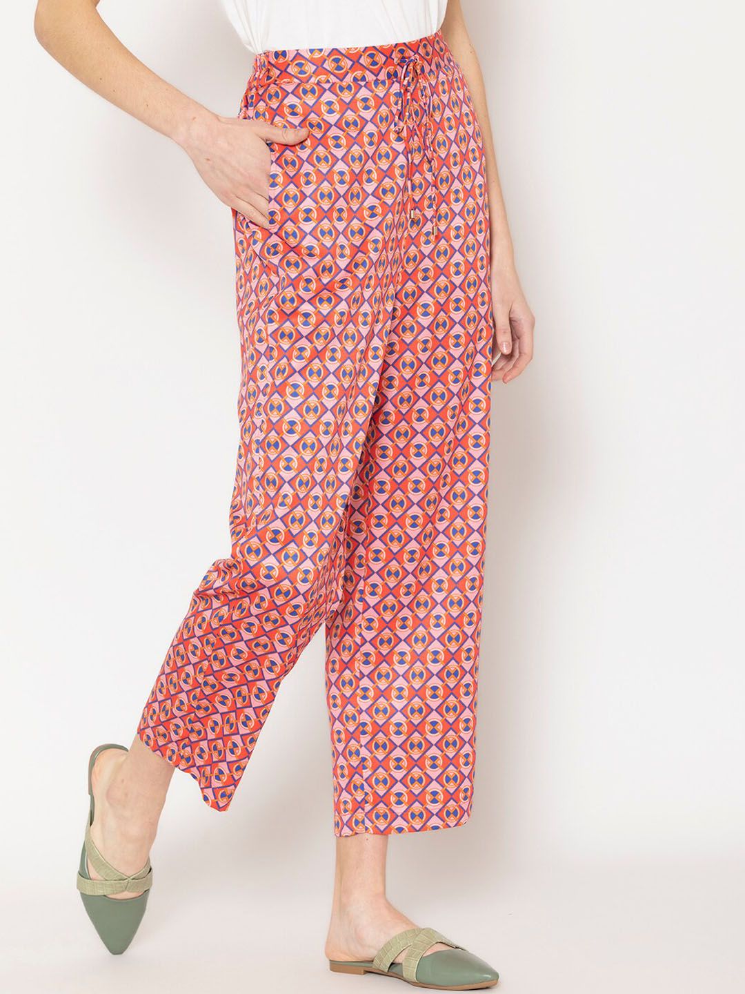 SHAYE Women Red Printed Regular-Fit Trousers Price in India