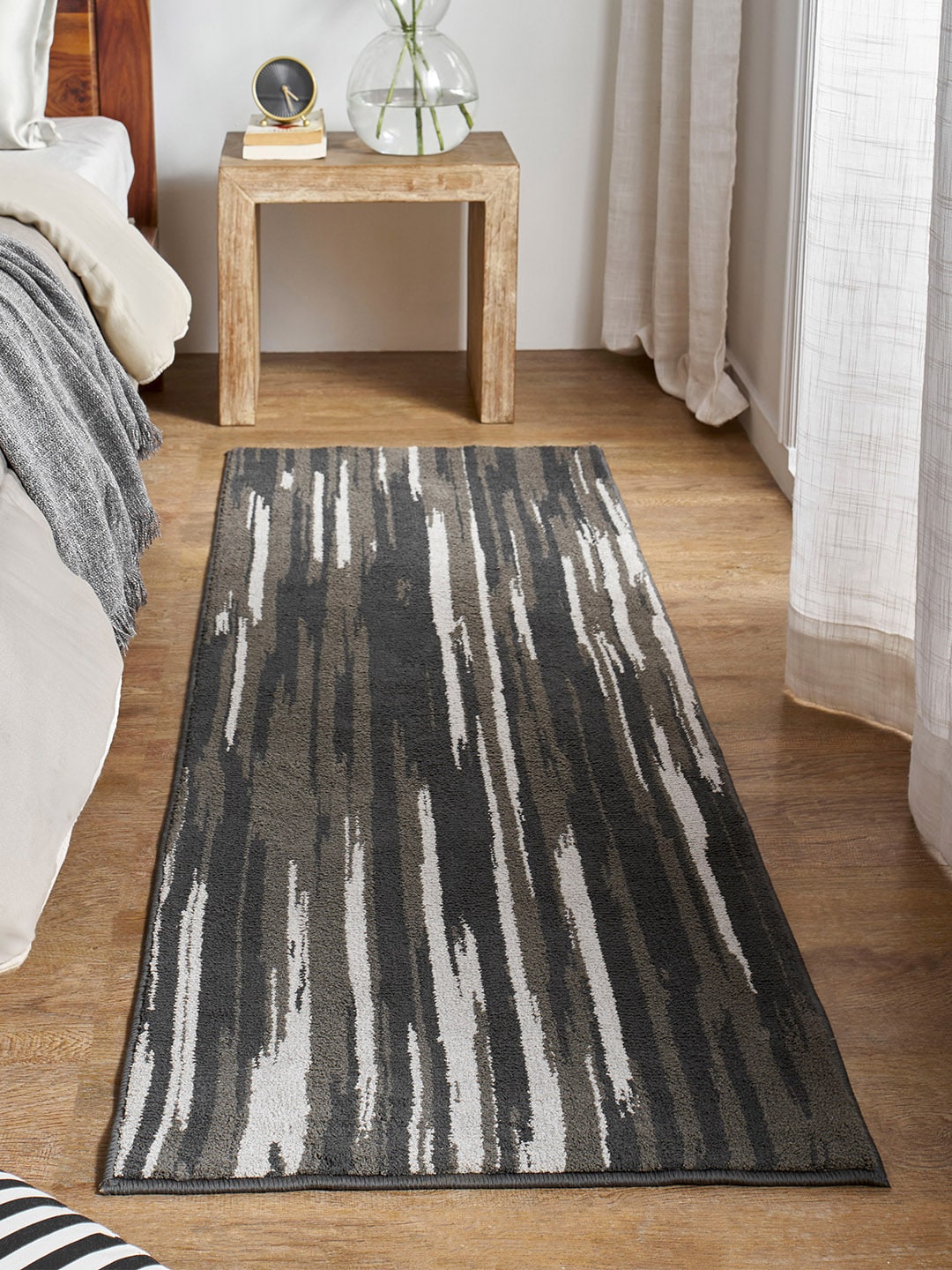 Trident Black & Grey Striped 3155 GSM Polyester Bath Rug Price in India
