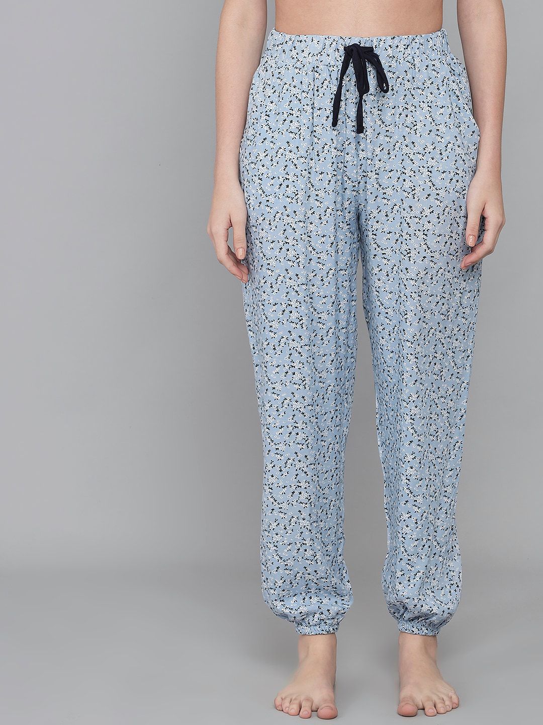 ANTI CULTURE Woman Turquoise-Blue & Black Printed Lounge Pants Price in India