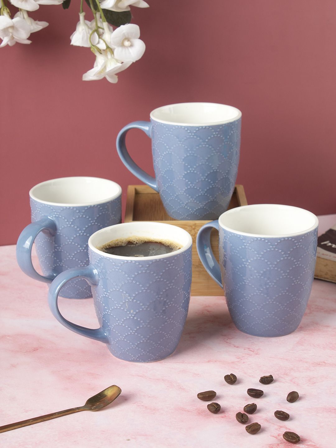 MARKET99 Blue Textured Set Of 4 Ceramic Glossy Mugs Price in India