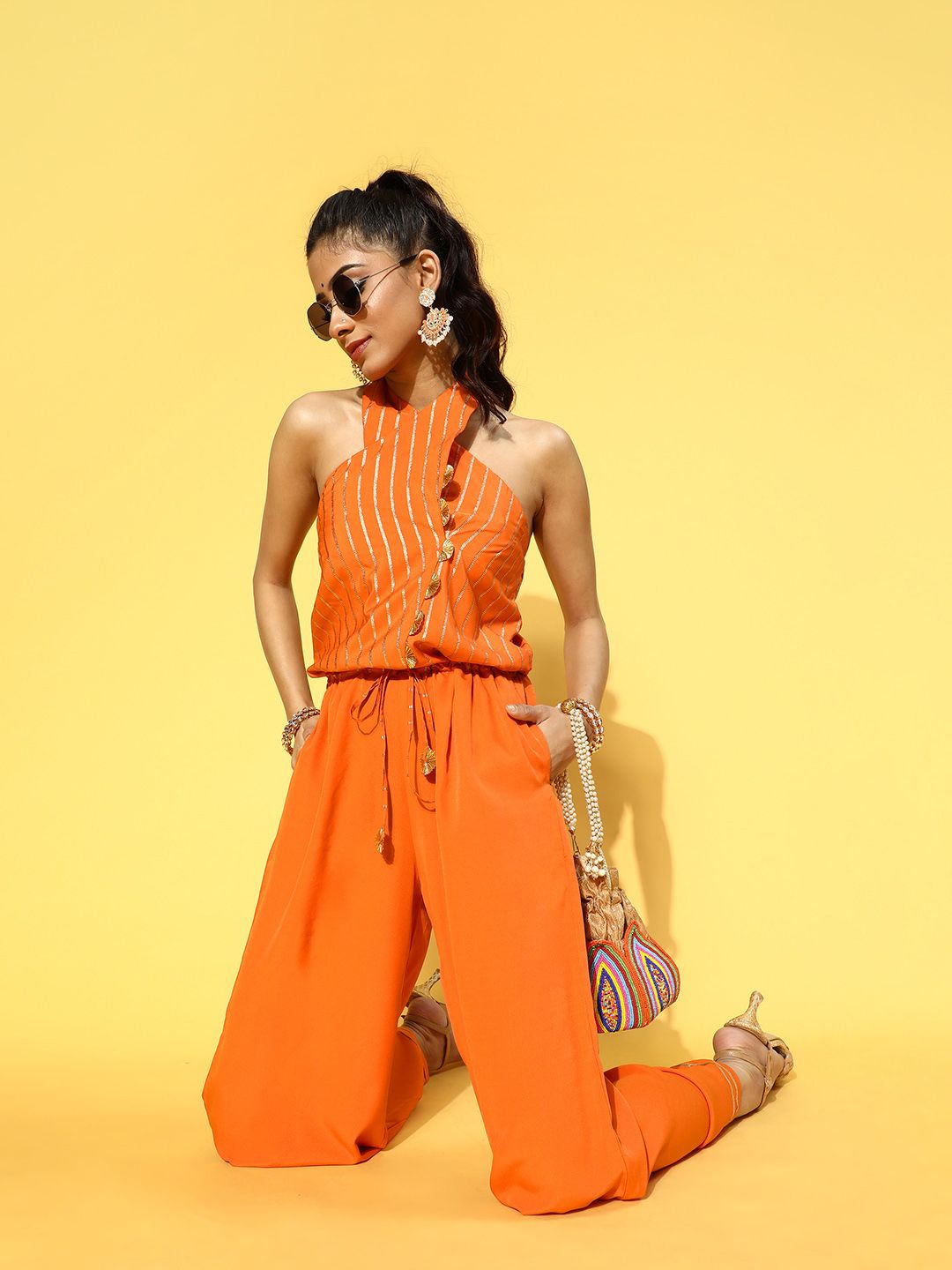 Ahalyaa Women Bright Orange Printed Elevated Jumpsuit Price in India