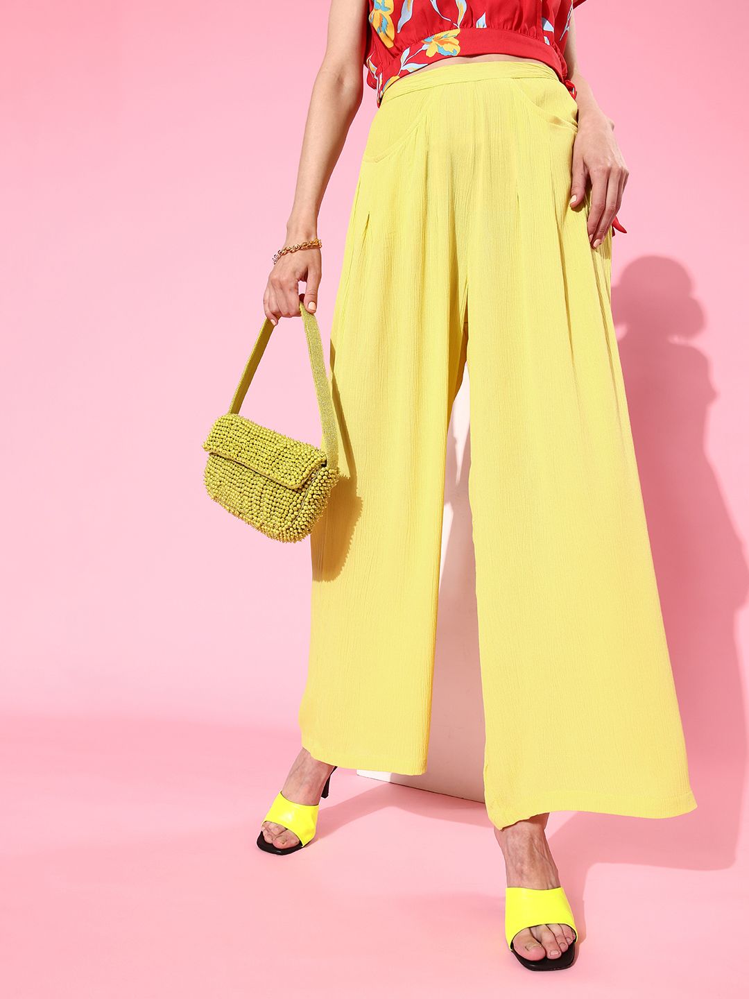 DressBerry Women Bright Yellow Solid Wide Leg Bottom Trousers Price in India
