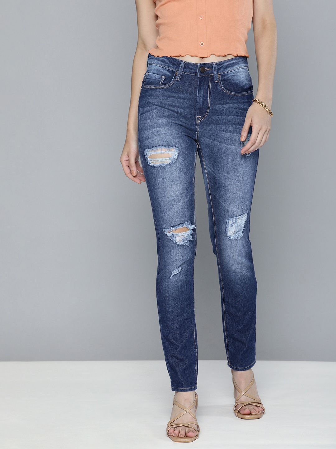 HERE&NOW Women Blue Slim Fit Highly Distressed Heavy Fade Stretchable Casual Jeans Price in India