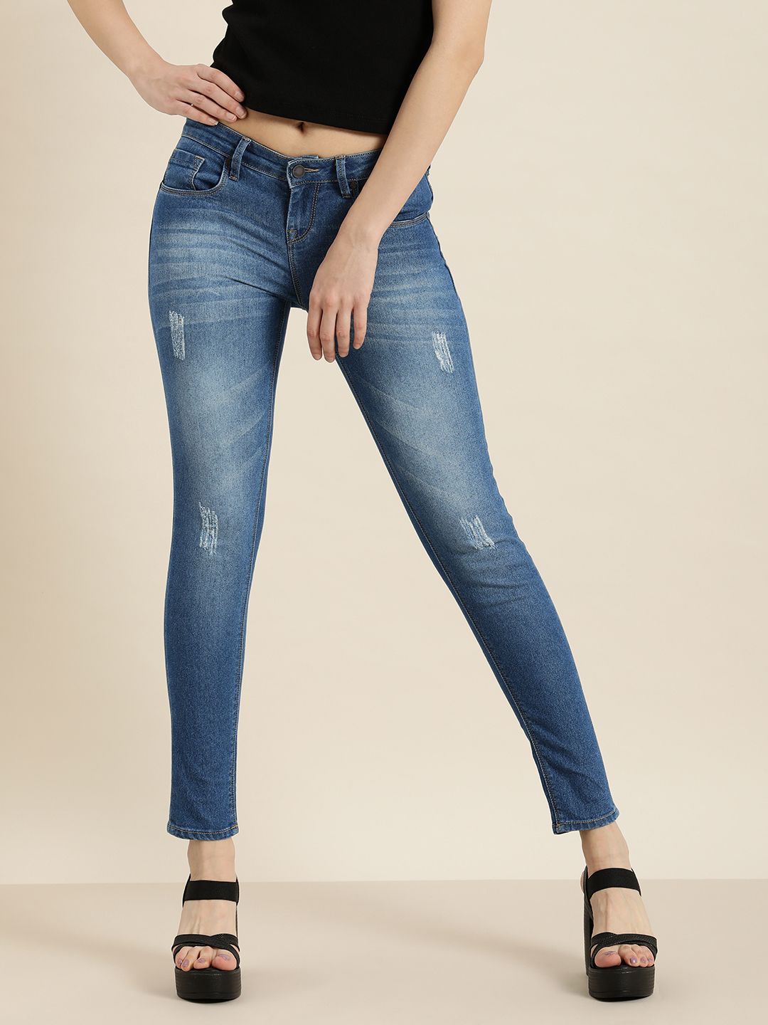 Moda Rapido Women Blue Skinny Fit Mildly Distressed Heavy Fade Stretchable Jeans Price in India