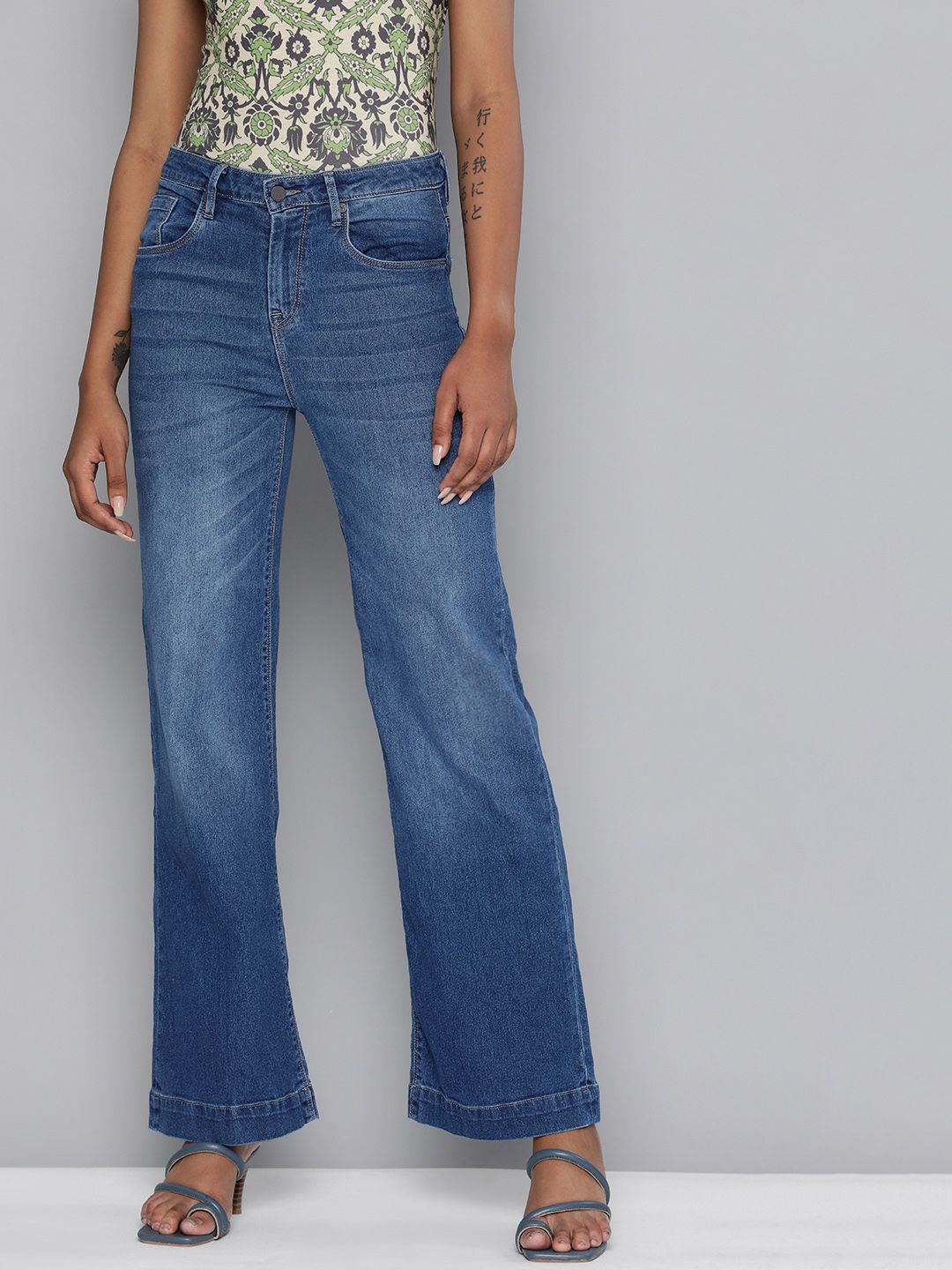 HERE&NOW Women Blue Wide Leg Mid-Rise Heavy Fade Stretchable Jeans Price in India