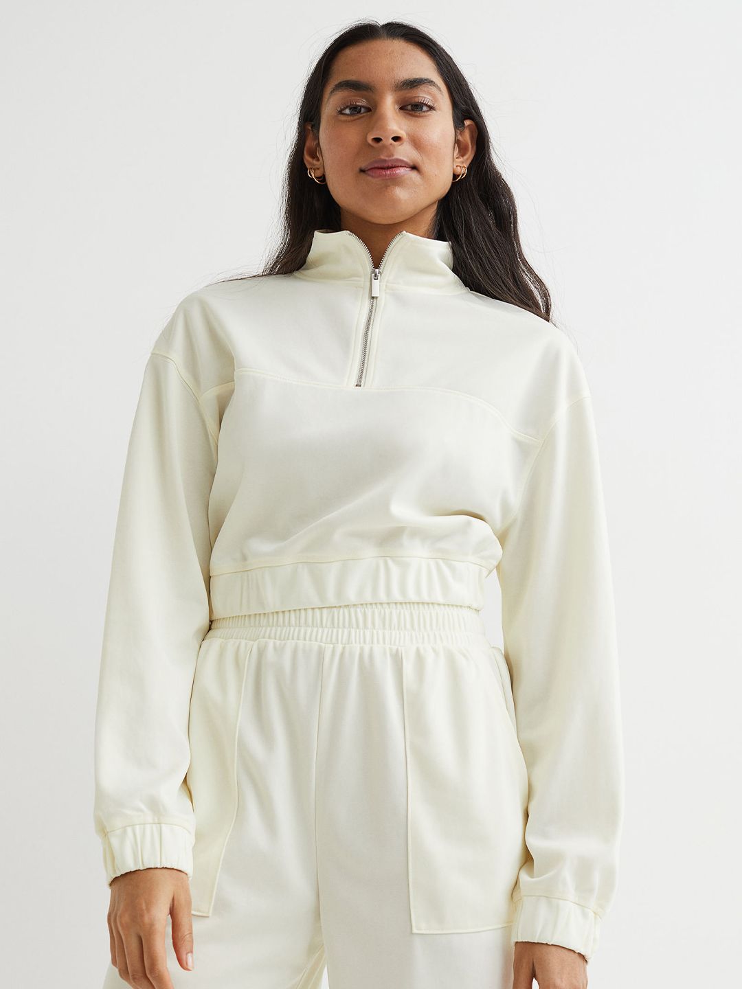 H&M Women White Solid Sports Sweatshirt Price in India