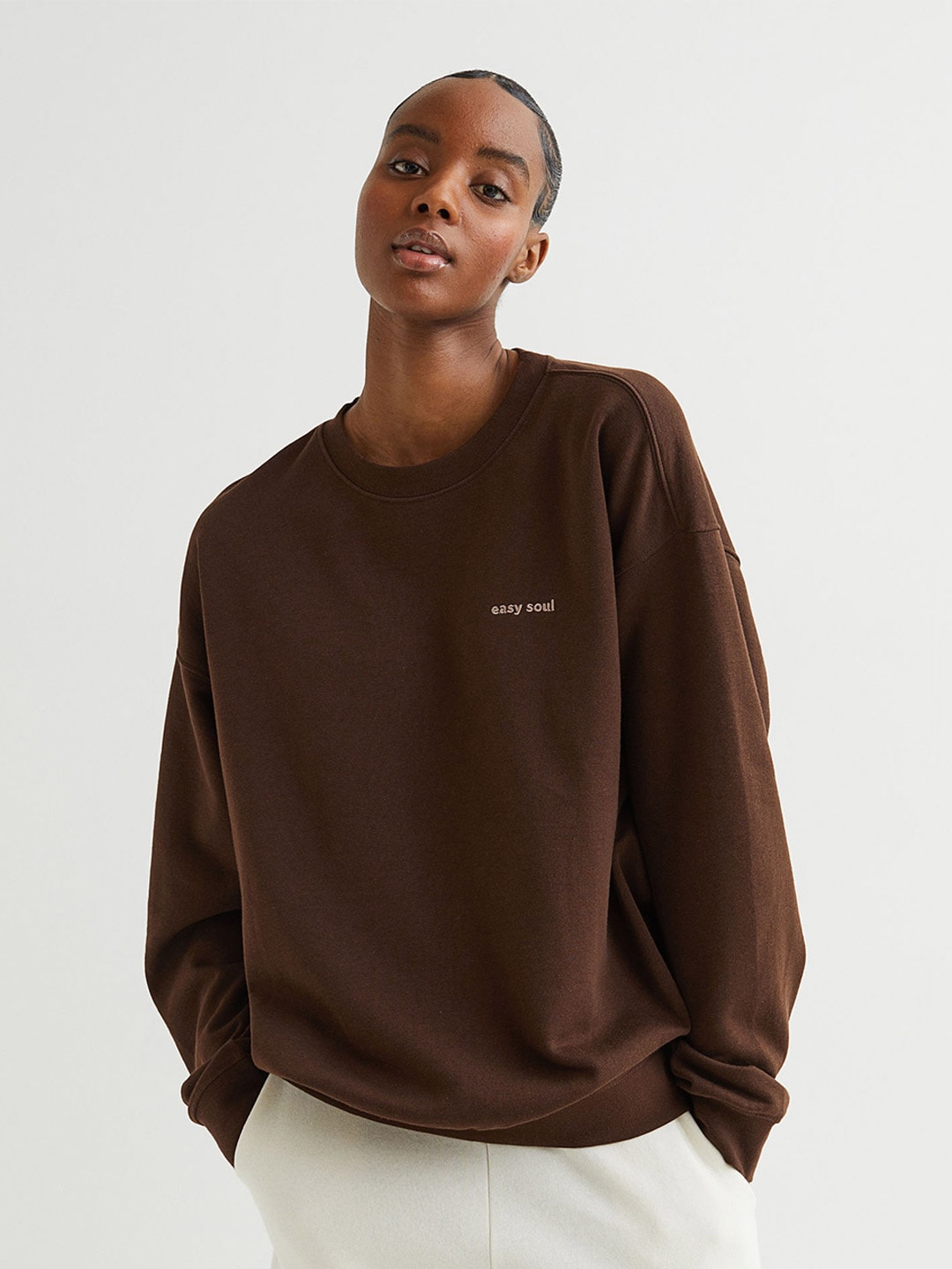 H&M Women Brown Solid Oversized Sweatshirt Price in India