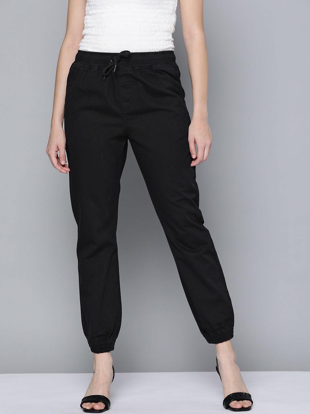 HERE&NOW Women Black Solid Woven Joggers Price in India