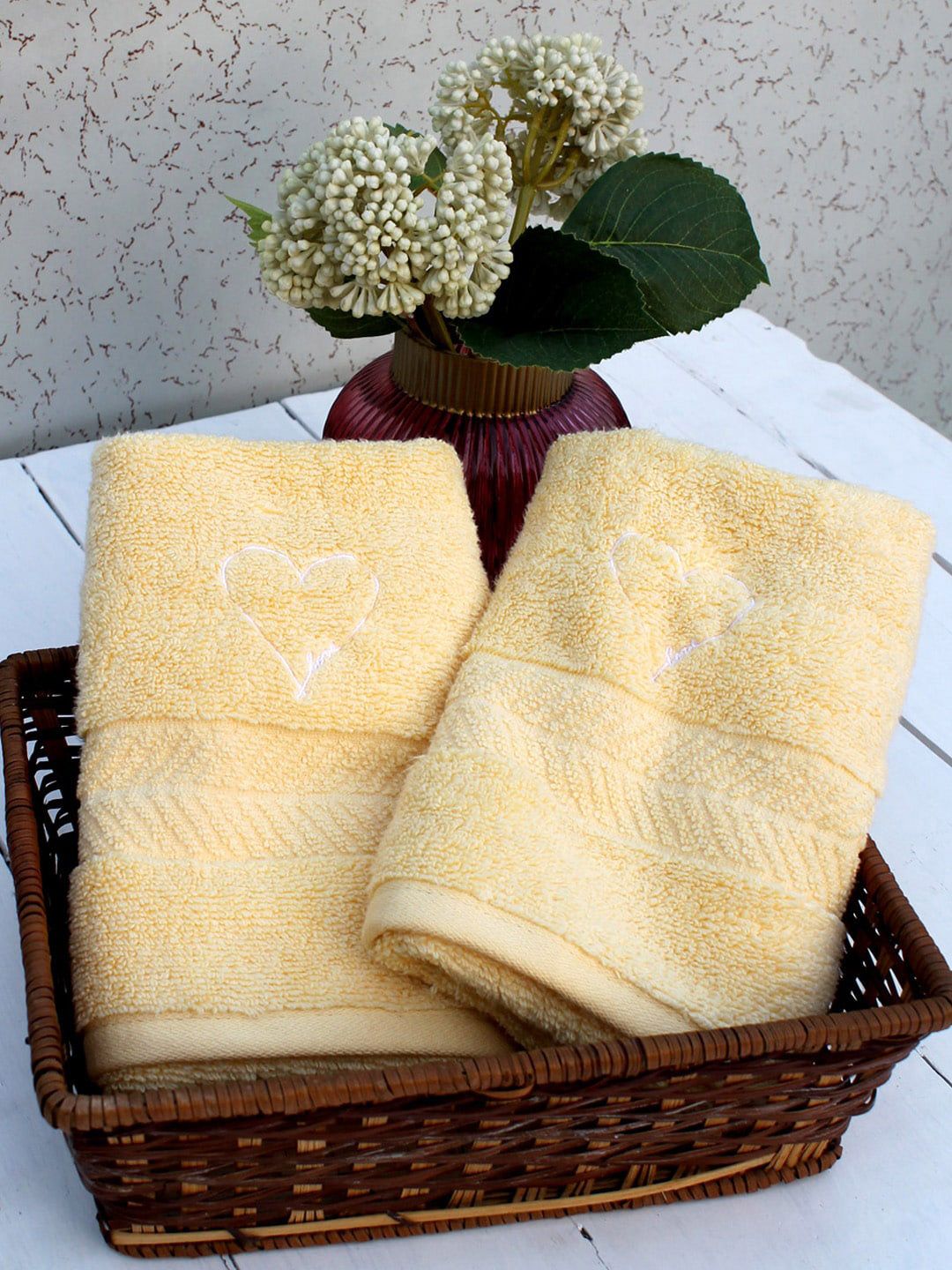 AVI Living Set Of 2 Yellow Solid Cotton 550 GSM Hand Towels Price in India