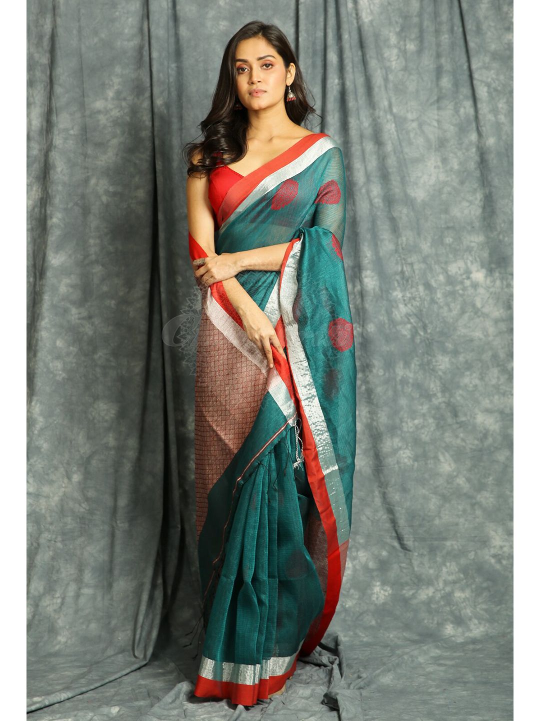 Charukriti Teal & Silver Woven Design Handloom Saree Price in India