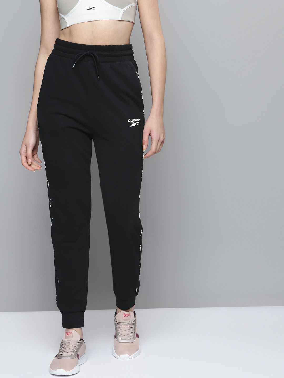 Reebok Women Black Piping Pack Solid Training Joggers Price in India