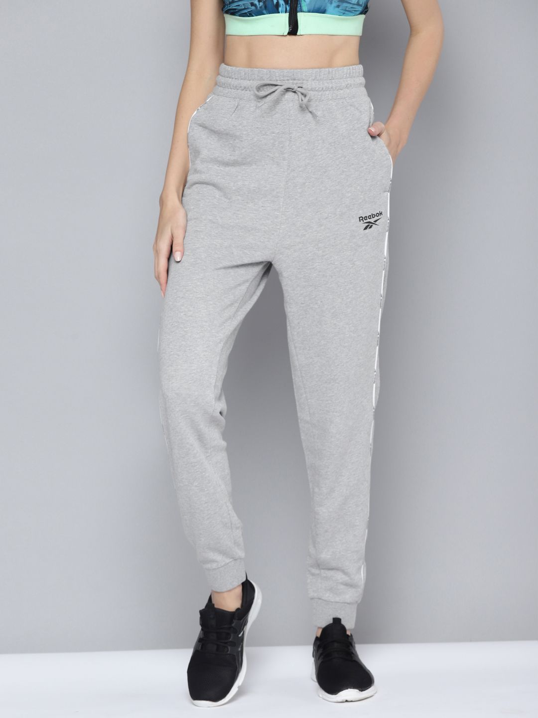 Reebok Women Grey Melange Piping Pack Solid Training Joggers Price in India