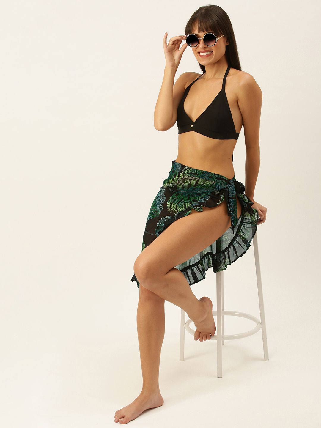SECRETS BY ZEROKAATA Black Solid Halter Neck Bikini Set & Tropical Print Sarong Price in India