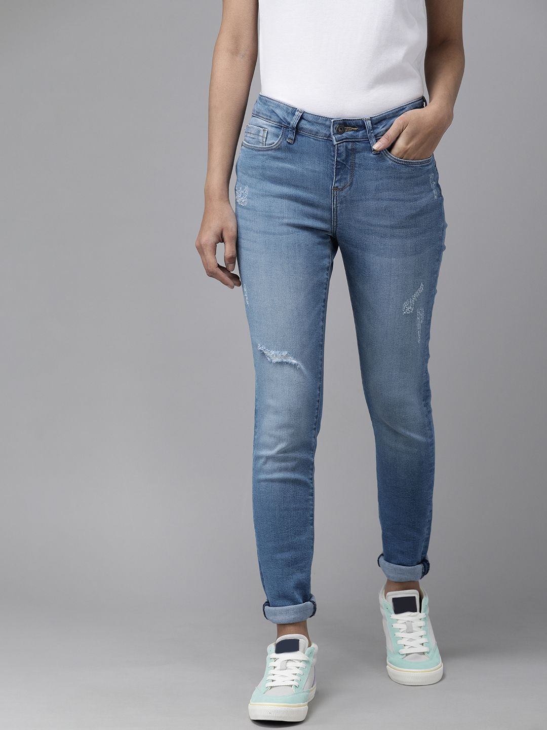 Vero Moda Women Blue Skinny Fit Mildly Distressed Light Fade Mid Rise Stretchable Jeans Price in India