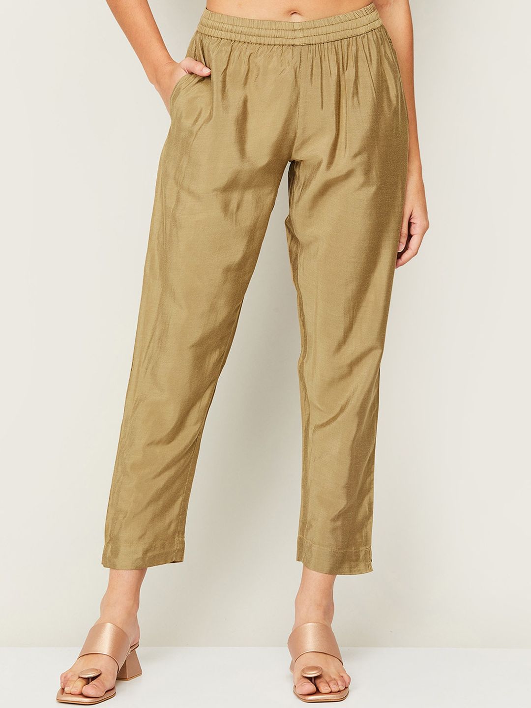 Melange by Lifestyle Women Gold-Toned Solid Cropped Trousers Price in India