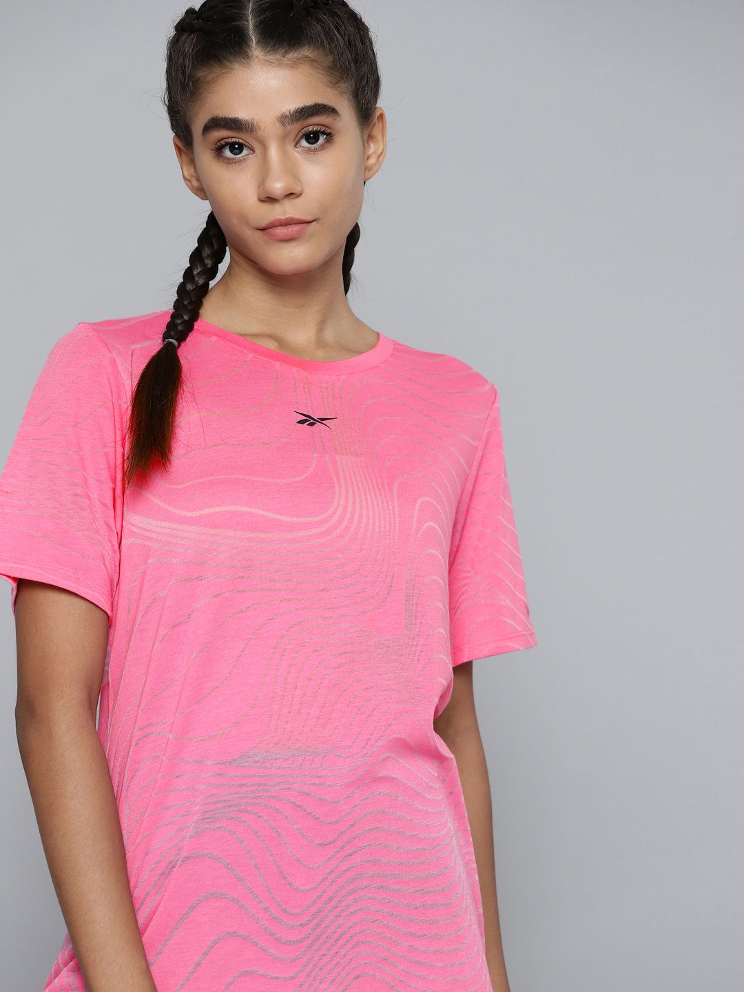 Reebok Women Pink Self Design Training or Gym T-shirt Price in India