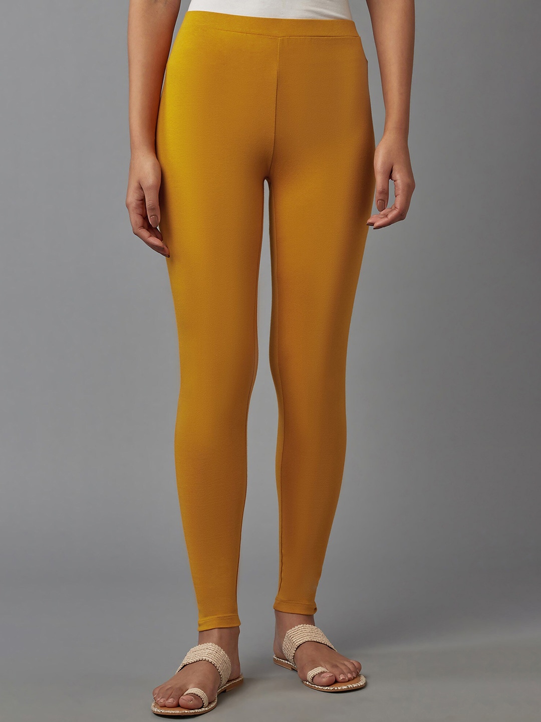 W Women Yellow Solid Mid Rise Ankle Length Leggings Price in India