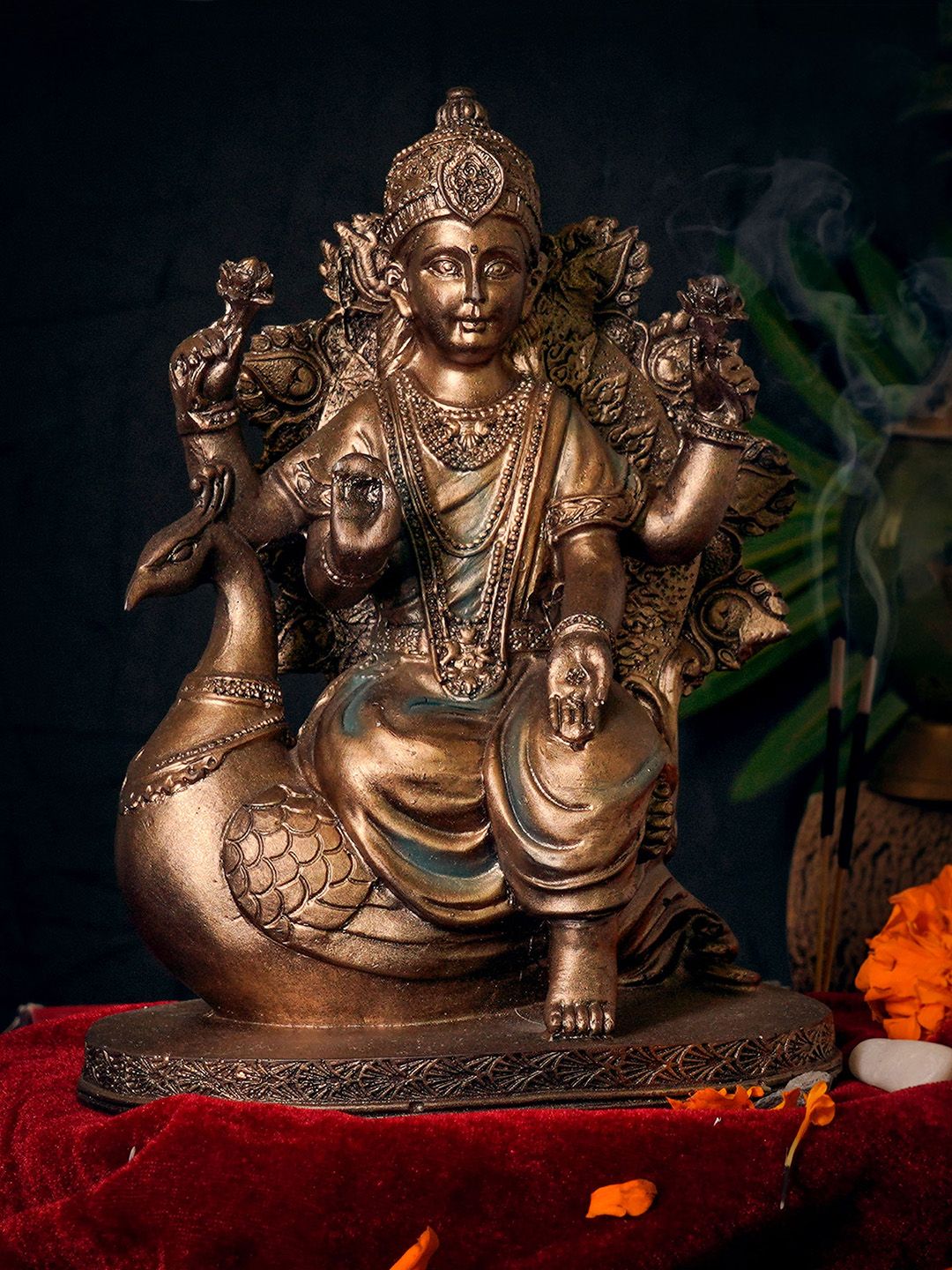 TIED RIBBONS Copper-Toned Maa Saraswati Sitting On Swan Idol Decorative Showpiece Price in India