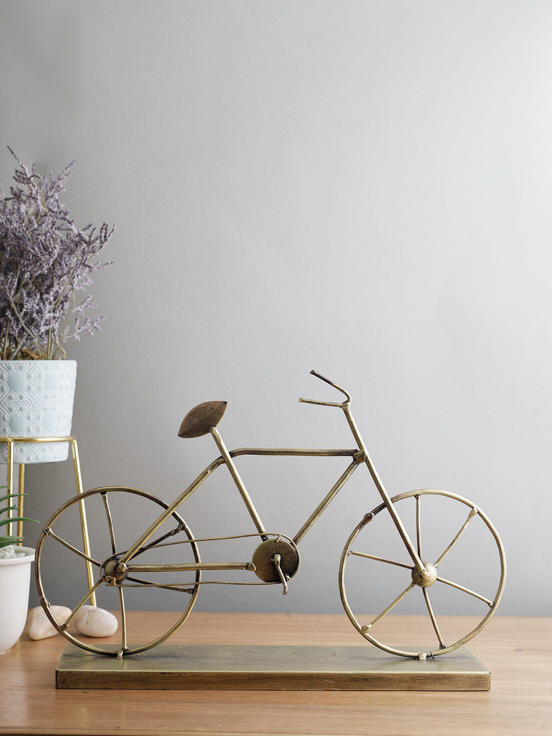 CraftVatika Gold-Toned Solid Metal Cycle Showpiece Price in India