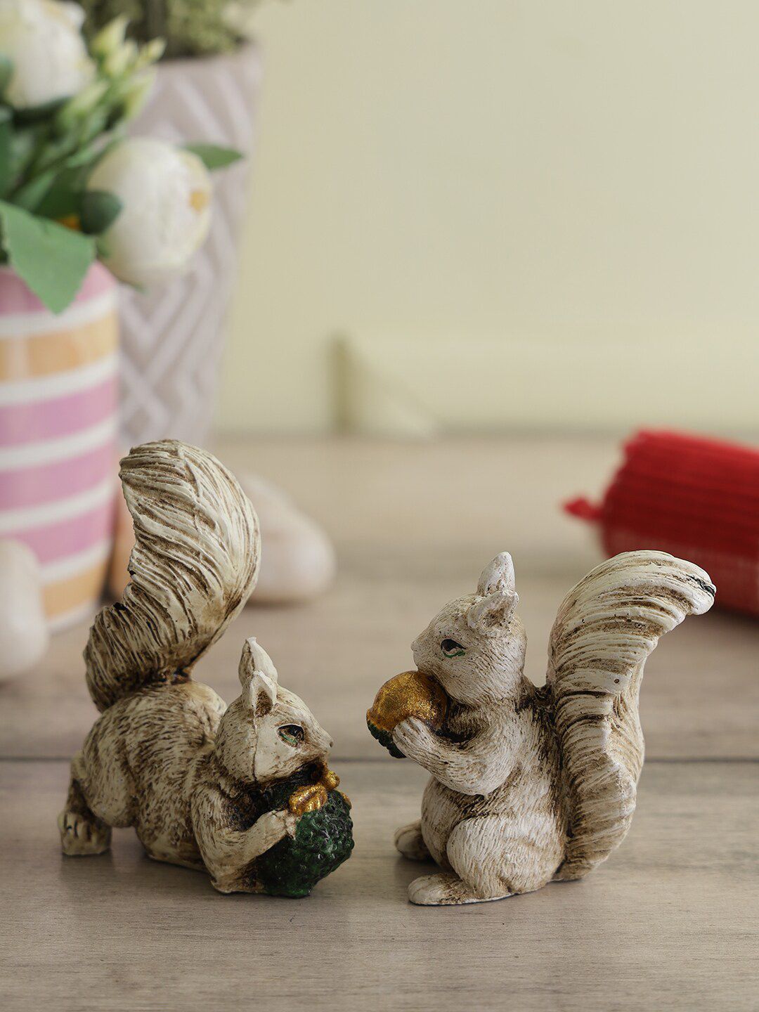 CraftVatika Set of 2 Beige Squirrels Holding Nuts Showpiece Price in India