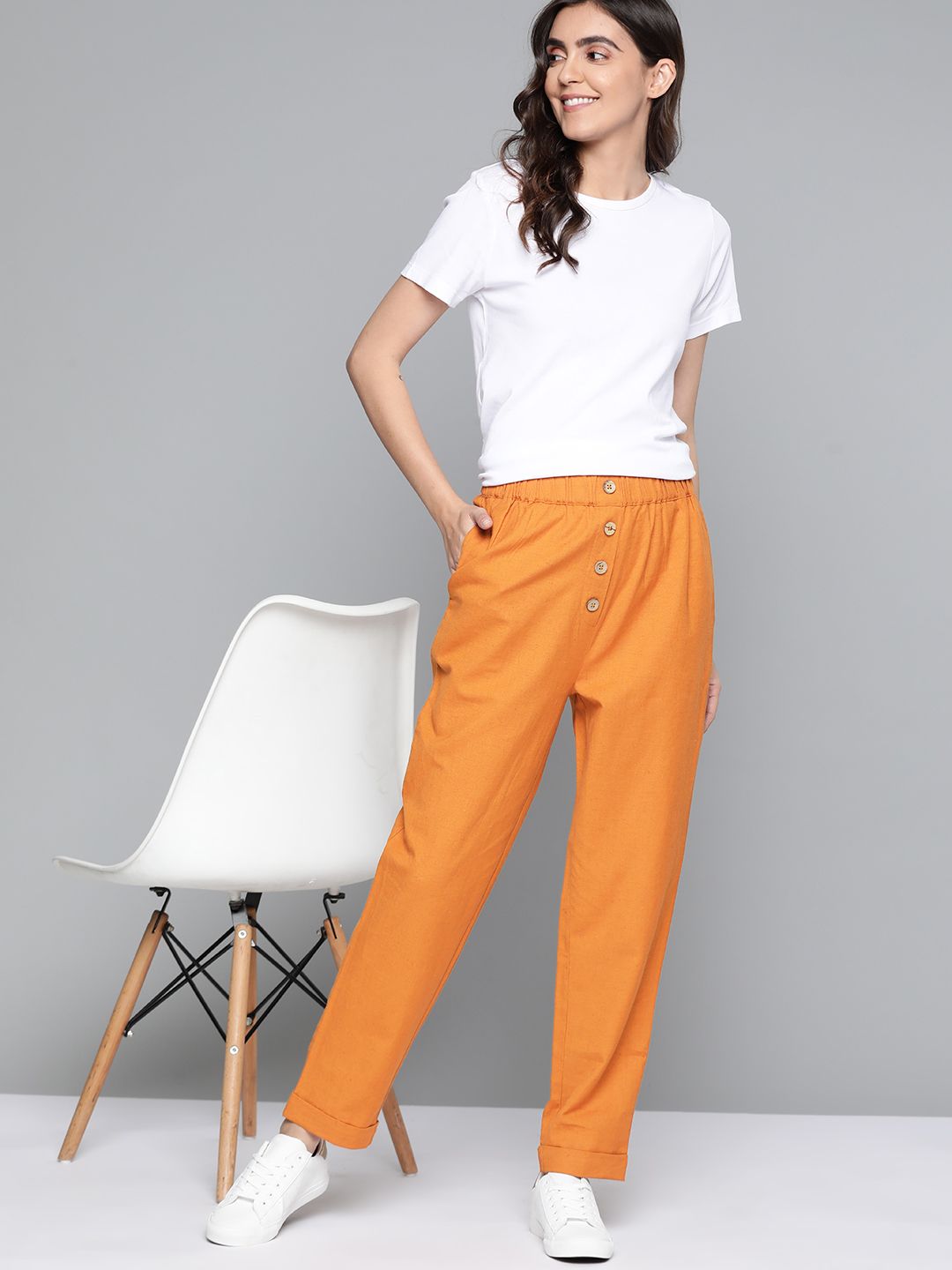 Mast & Harbour Women Rust Orange Solid Pure Cotton Trousers Price in India