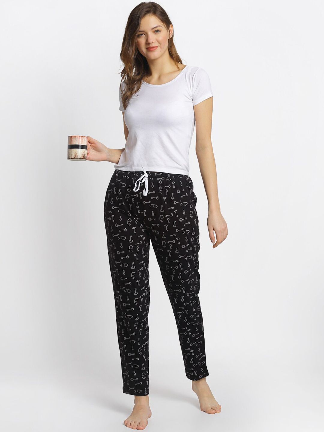 Claura Women Black Printed Pure Cotton Lounge Pants Price in India