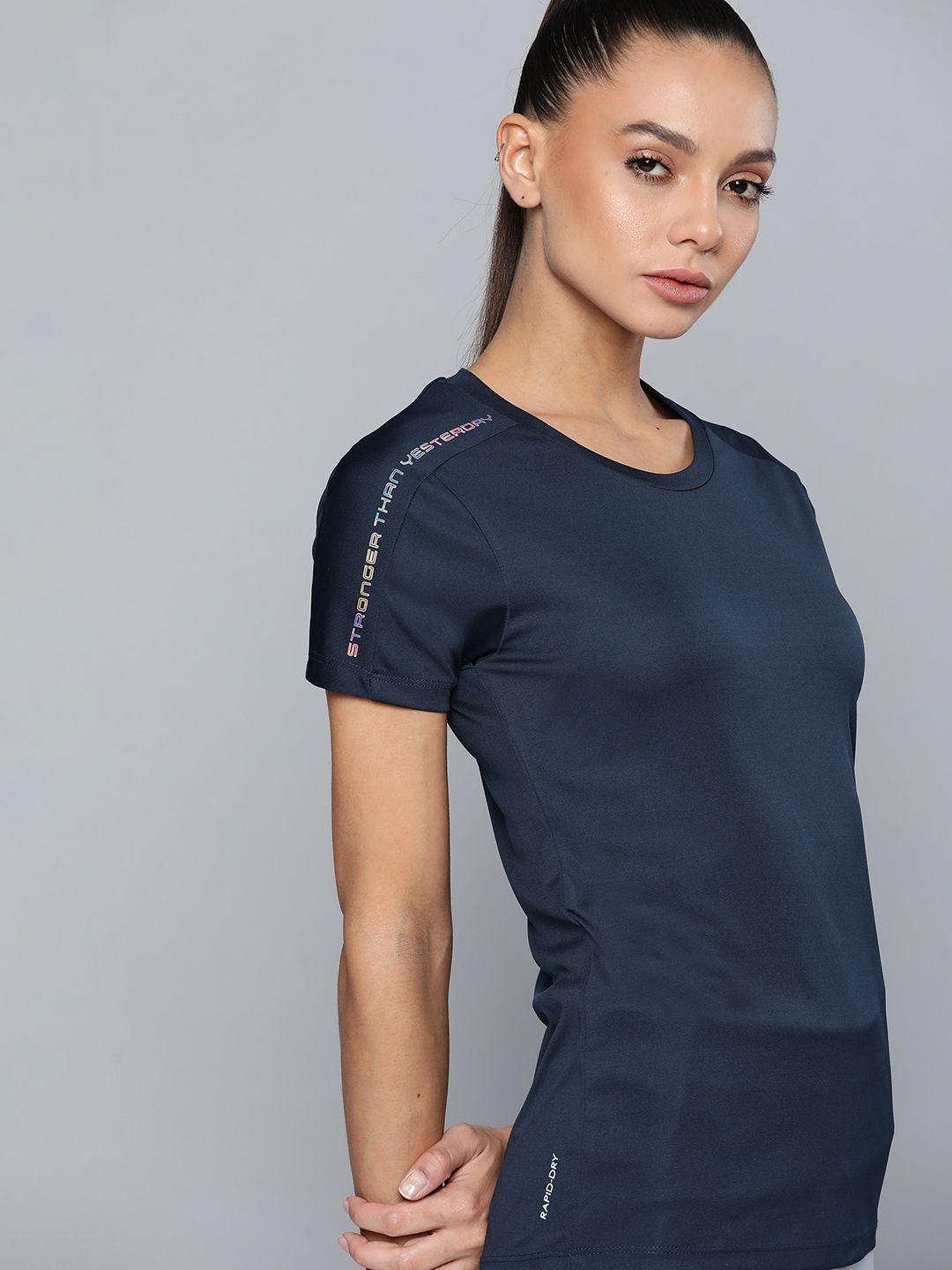 HRX By Hrithik Roshan Training Women Midnight Navy Rapid-Dry Solid Tshirts Price in India