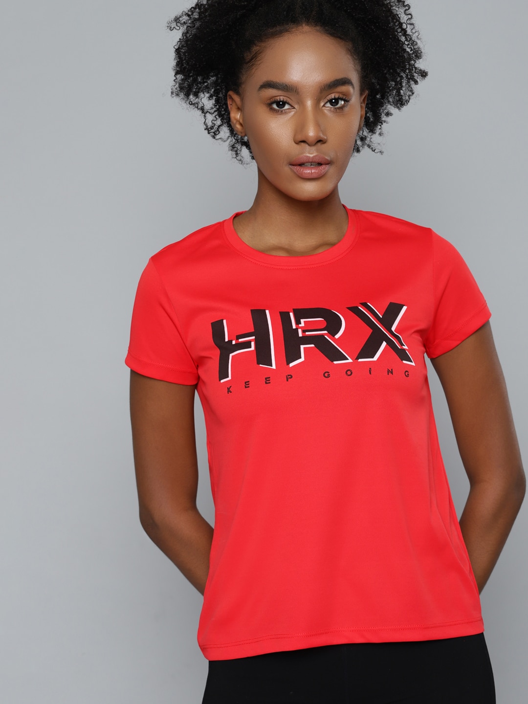 HRX By Hrithik Roshan Training Women Formula Red Rapid-Dry Brand Carrier Tshirt Price in India