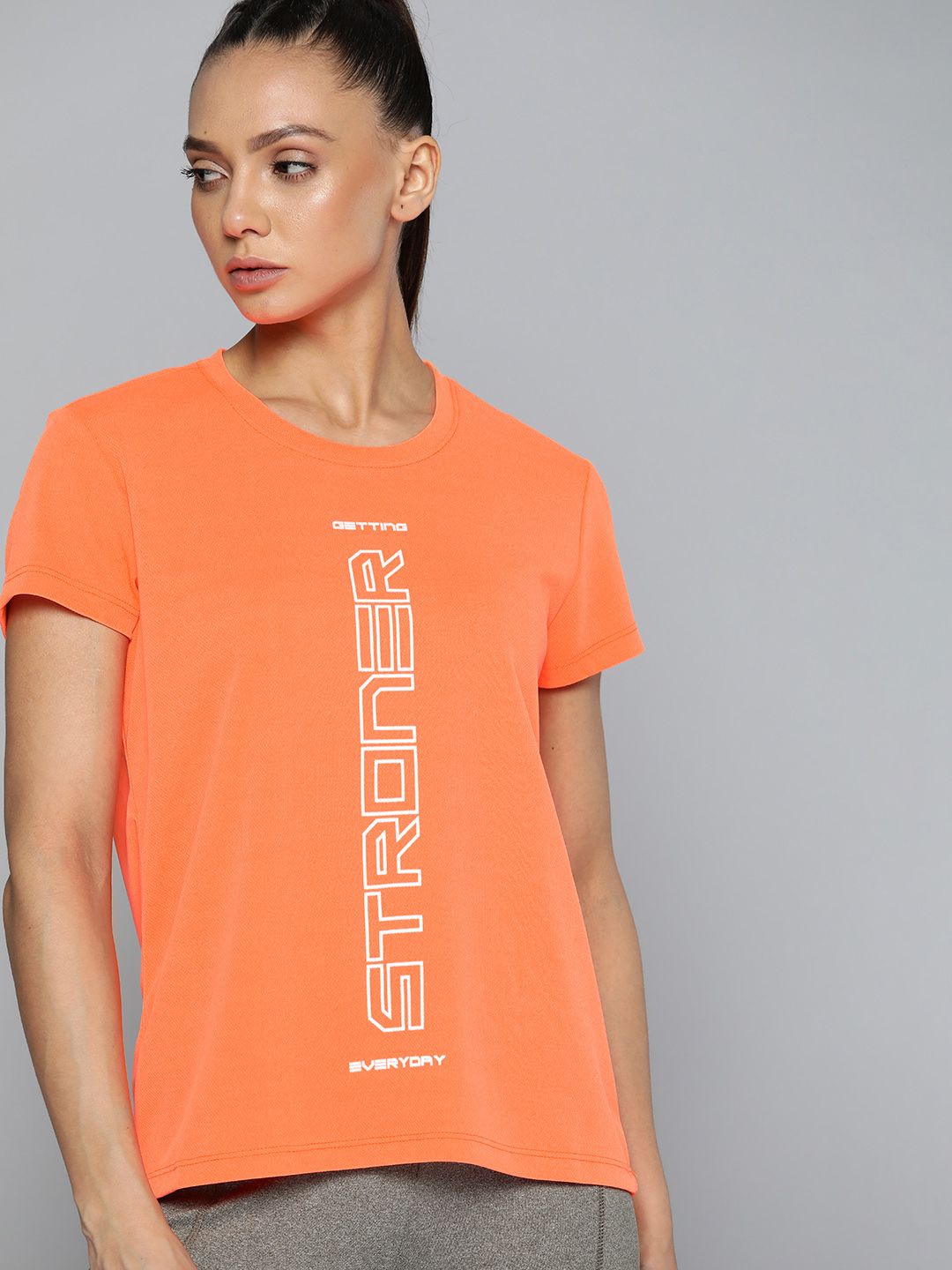 HRX By Hrithik Roshan Training Women Neon Orange Rapid-Dry Typography Tshirts Price in India