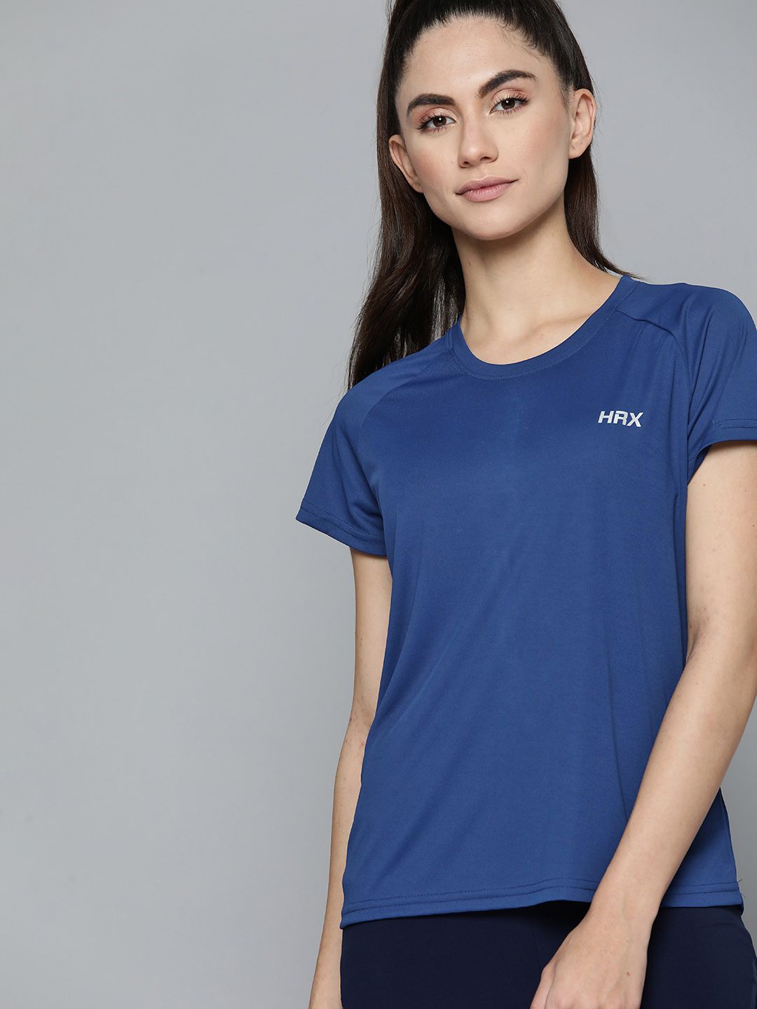 HRX By Hrithik Roshan Training Women Estate Blue Rapid-Dry Solid Tshirts Price in India