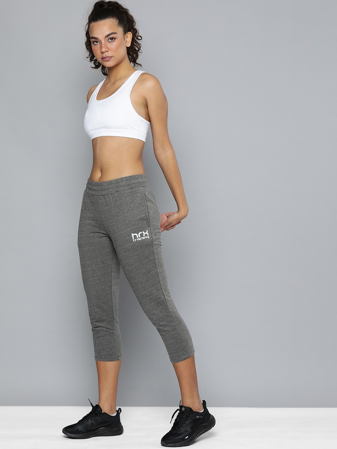 HRX By Hrithik Roshan Training Women Grey Anthra Melange Rapid-Dry Solid Track Pants Price in India
