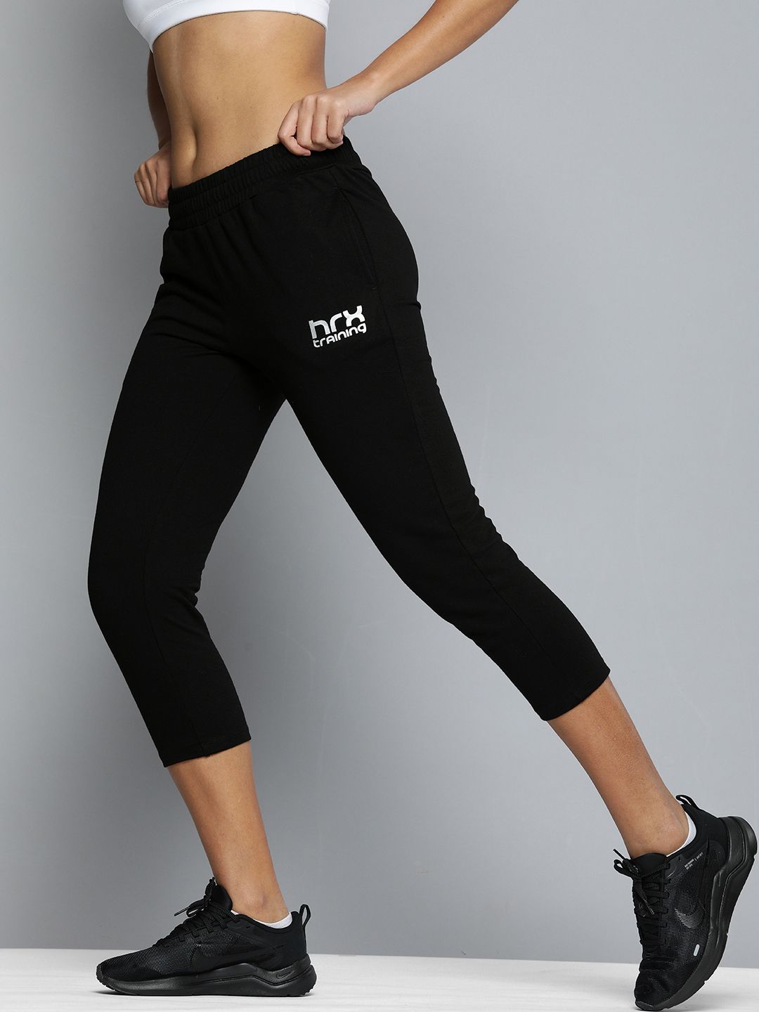 HRX By Hrithik Roshan Training Women Jet Black Rapid-Dry Solid Track Pants Price in India
