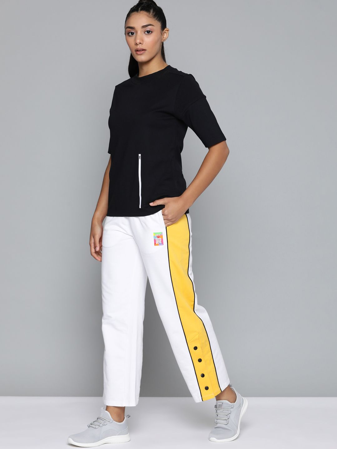 HRX by Hrithik Roshan Women White & Yellow Colourblocked Track Pants Price in India