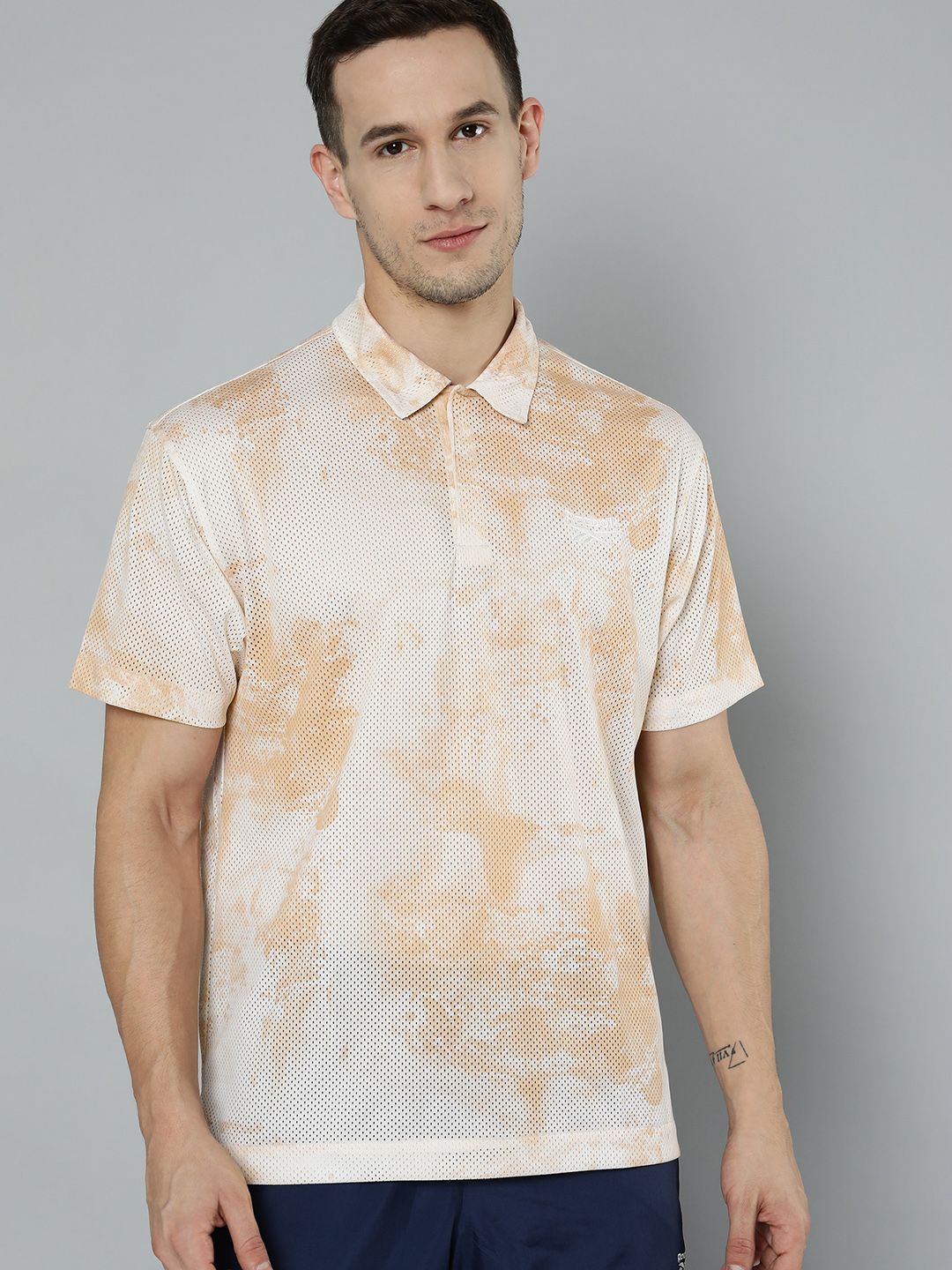 Reebok Classic Unisex Beige Classics Mesh Allover Tie and Dye Print Polo Collar T-shirt Price in India