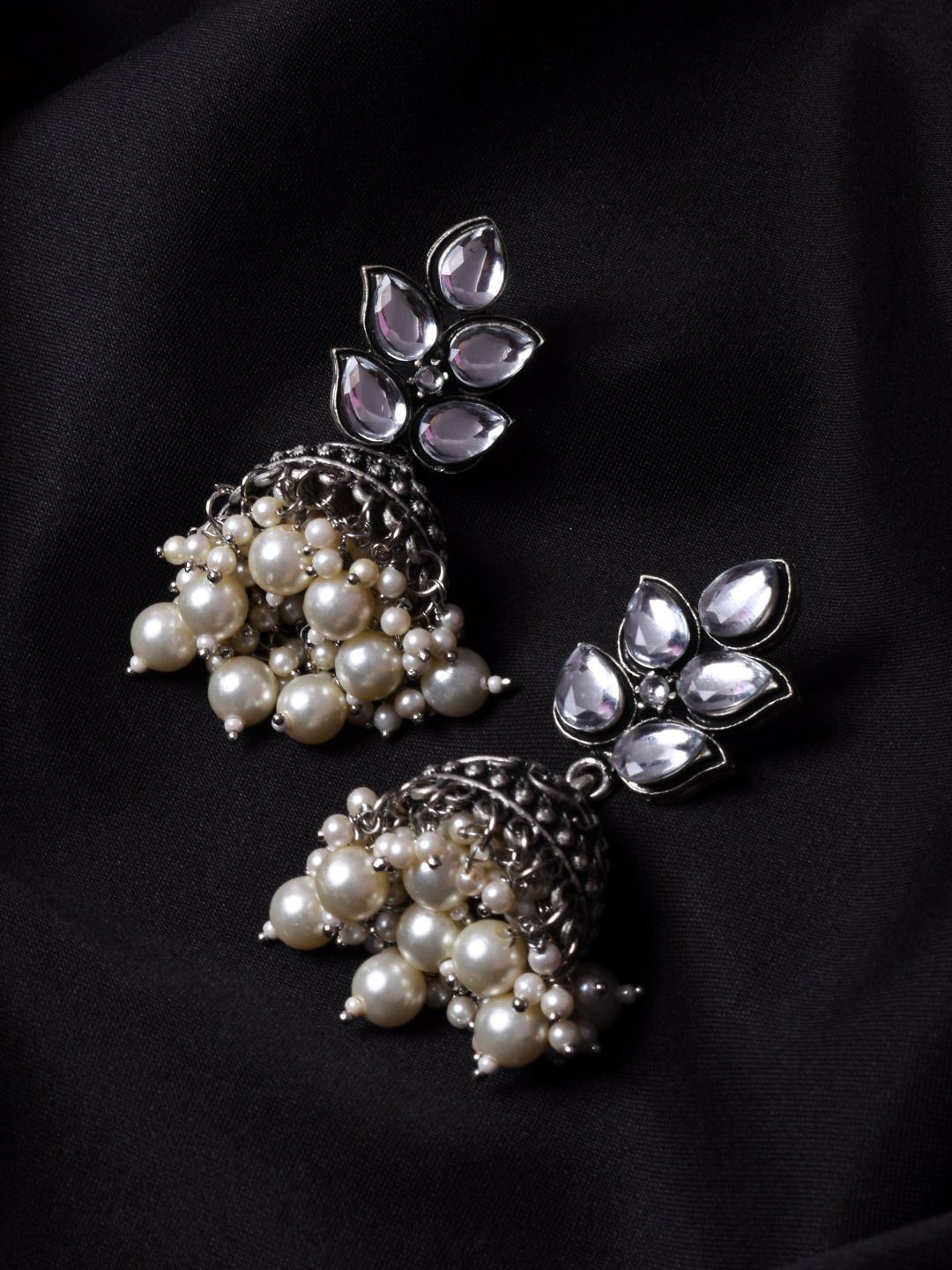 STEORRA JEWELS Silver-Plated Contemporary Jhumkas Earrings Price in India