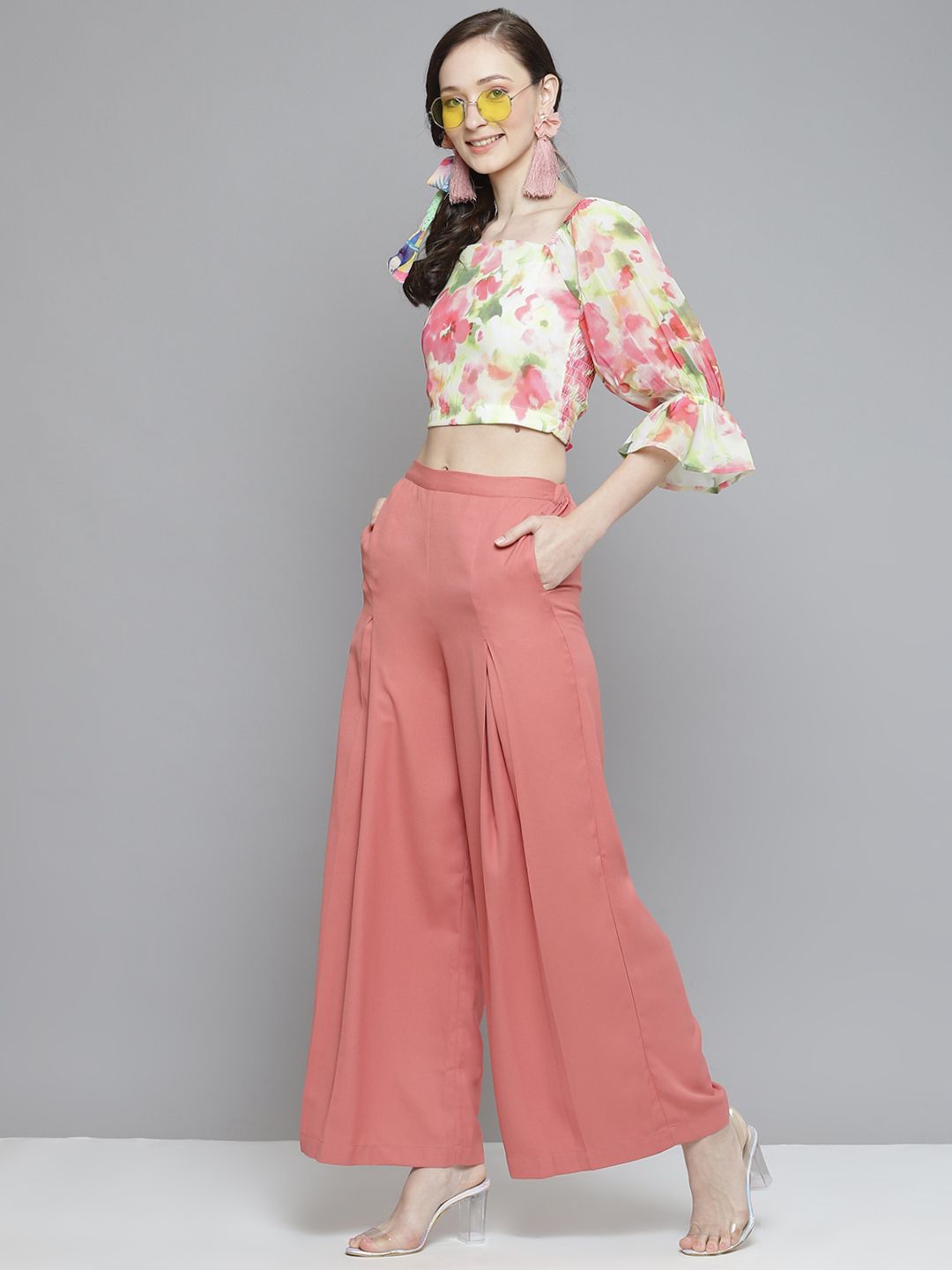 SASSAFRAS Women Pink Flared High-Rise Pleated Trousers Price in India