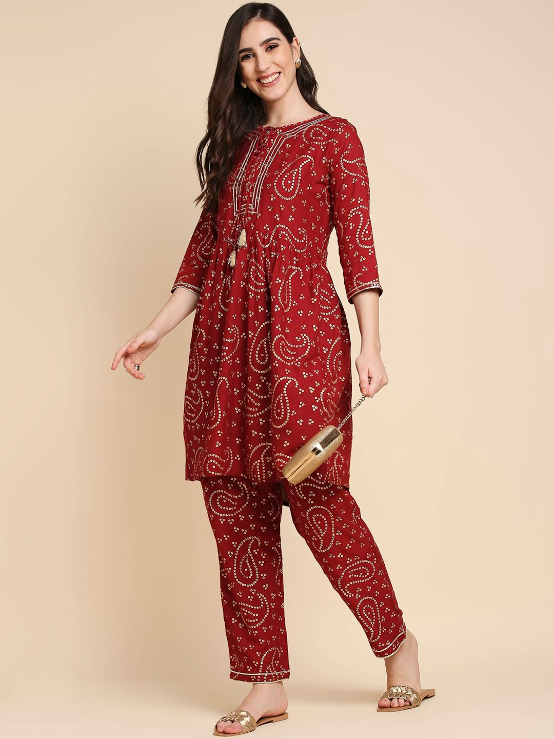 Anubhutee Women Maroon Bandhani Printed Gotta Patti Kurti with Trousers Price in India