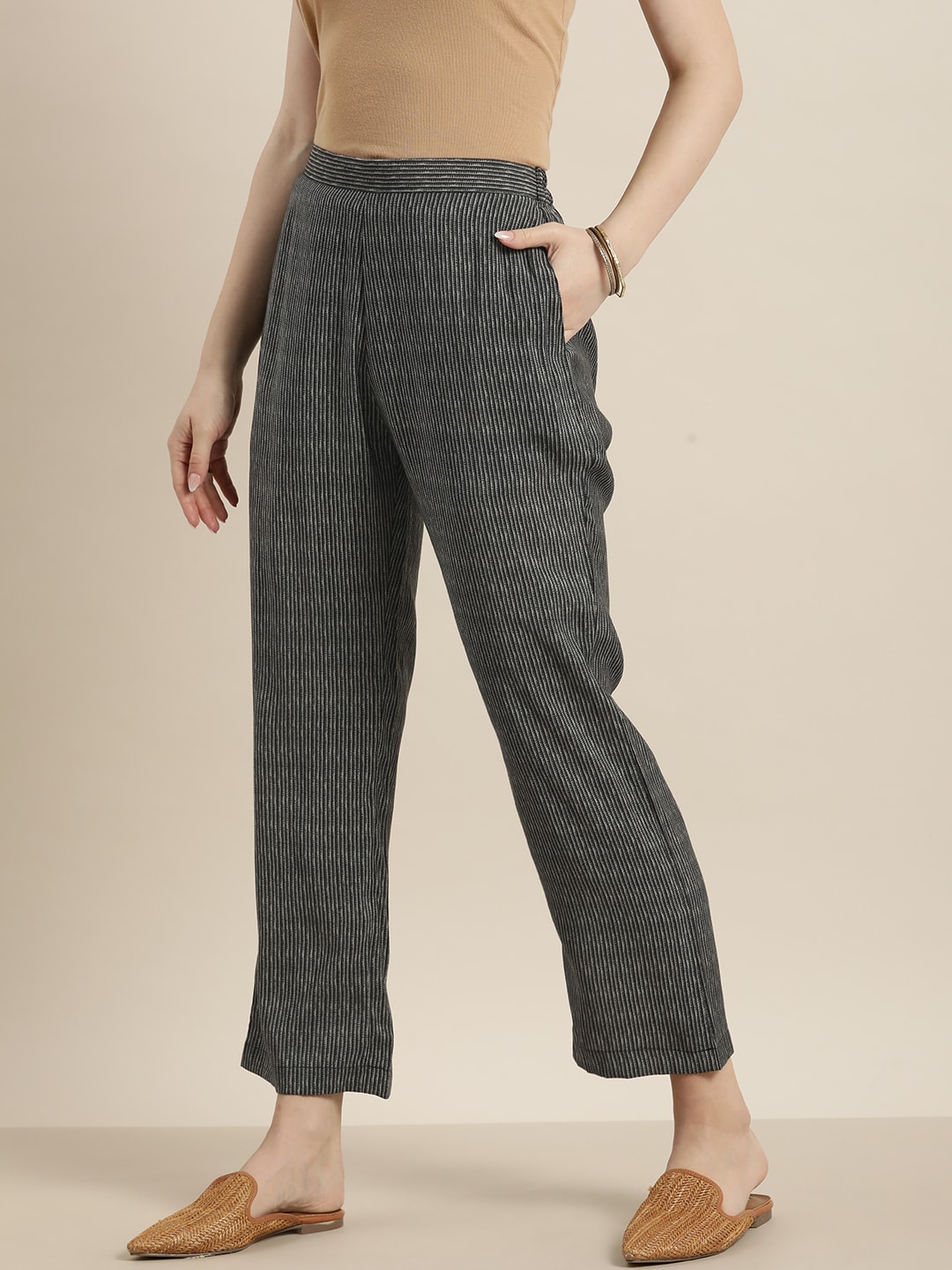 Sangria Women Black Striped Trousers Price in India