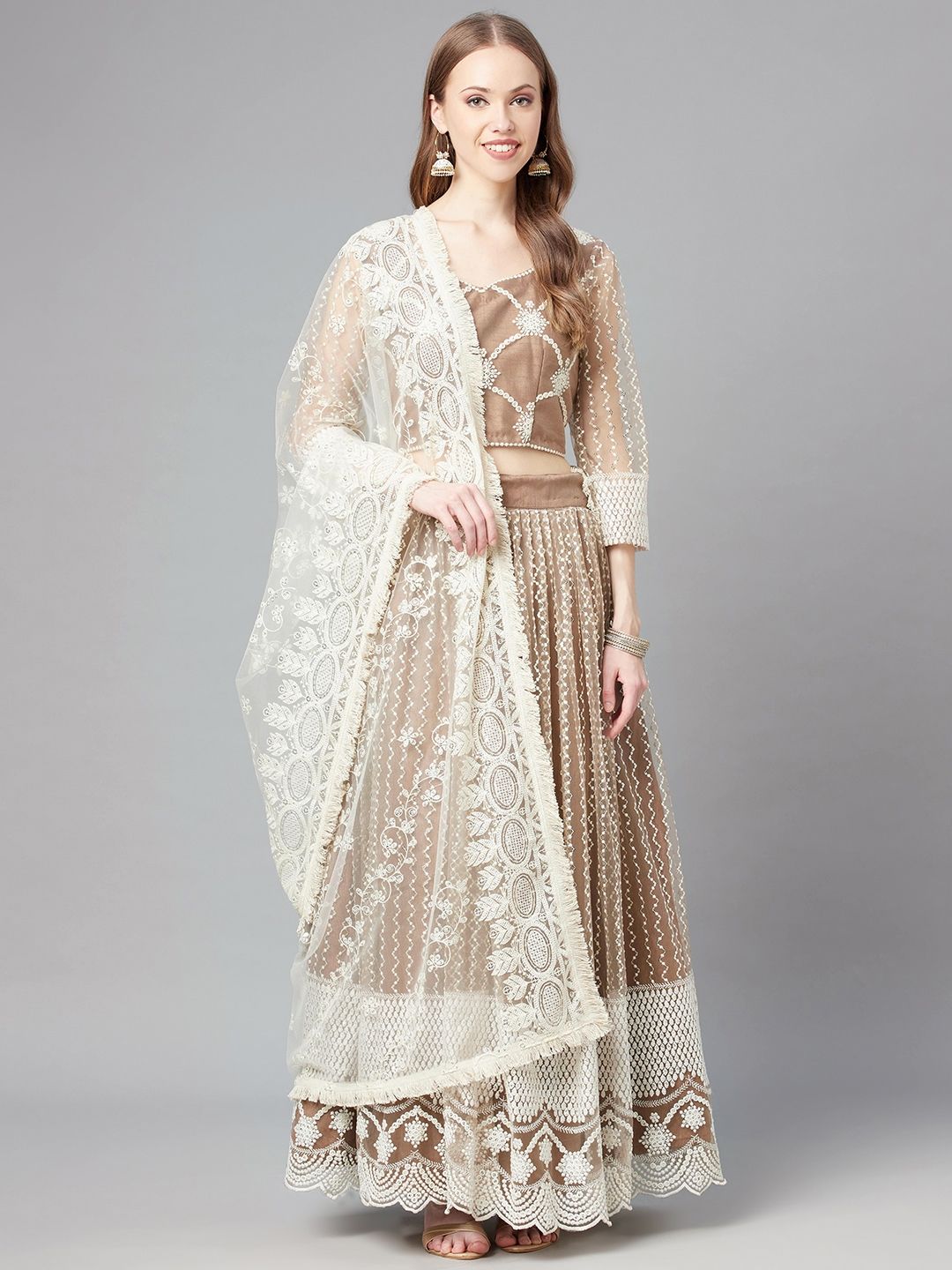 Readiprint Fashions Beige & White Embroidered Sequinned Unstitched Lehenga & Blouse With Dupatta Price in India